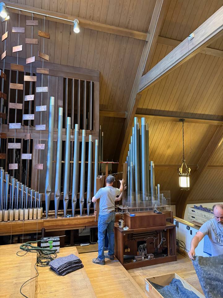 Lincoln Pipe Organs team removing pipework from the Great division